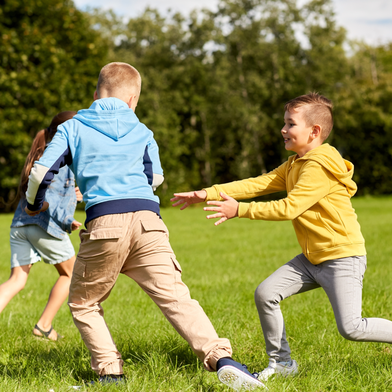 Kids playing tag outside