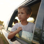 Boy leaning out of window exploring unconscious bias