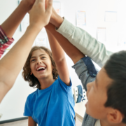 Teens playing one of the best teambuilding activities for teens