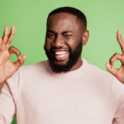 Happy man with okay hand sign