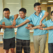 Training workshop participants playing fun team energiser Gotcha in China