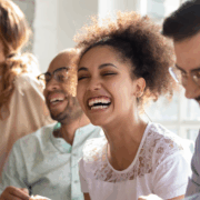 Happy woman playing team-building games for employees