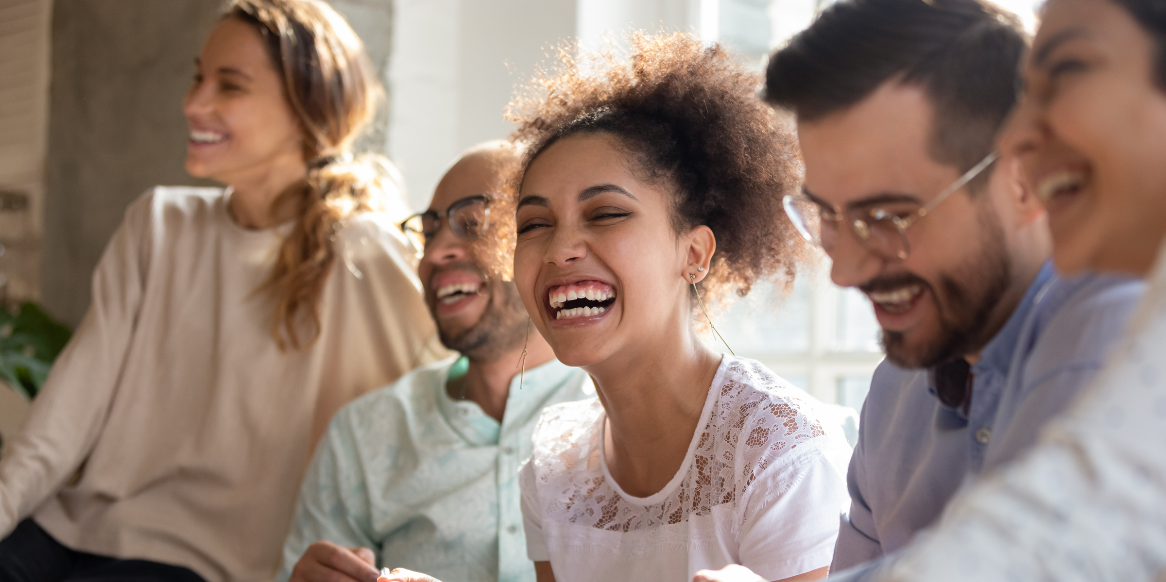 Happy woman playing team-building games for employees