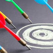 Darts missing the bullseye representing the biggest mistake when leading icebreakers