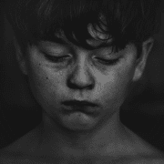 Battling bullying boy in tears. Credit kat-j-525336-unsplash
