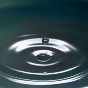 Water droplet ripple making an impact