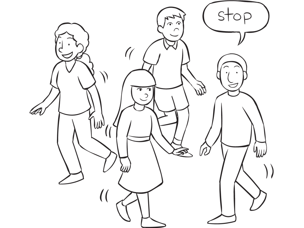 Four people moving about an area with one person saying Stop as part of energiser Walk & Stop