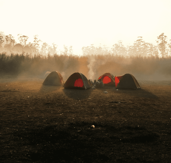 Tents in wilderness, group development process of adventure therapy groups. Credit Kilarov Zaneit