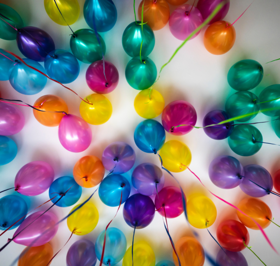 Helium balloons on ceiling casting mindfulness. Credit Edi Goldstein