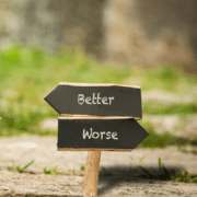 Better off or worse off sign posts shutterstock_1891460809