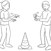 Two people playing the fast-paced group game Switch