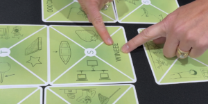 Connectiles Closeup of Tiles with Pointing Fingers