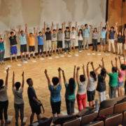 Group in circle engaged in quick and easy team-building games