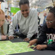 Women enjoying Connectiles team-building game for work