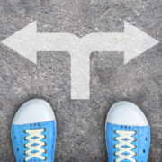 Arrows left and right in front of sneakers