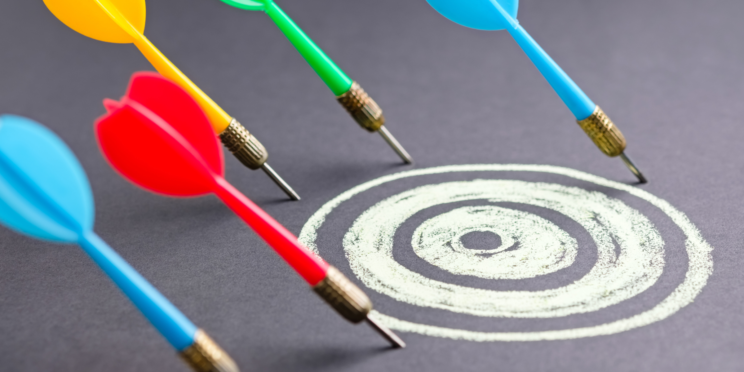 Darts missing the bullseye representing the biggest mistake when leading icebreakers